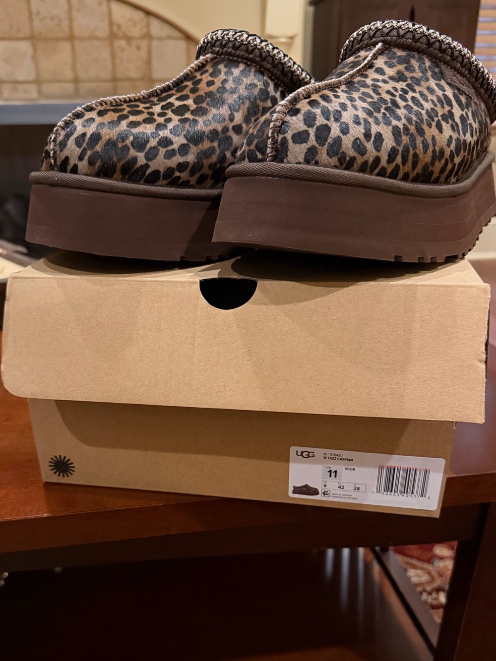 UGG Leopard Print Slip-On Platform Clogs in Brown and Black